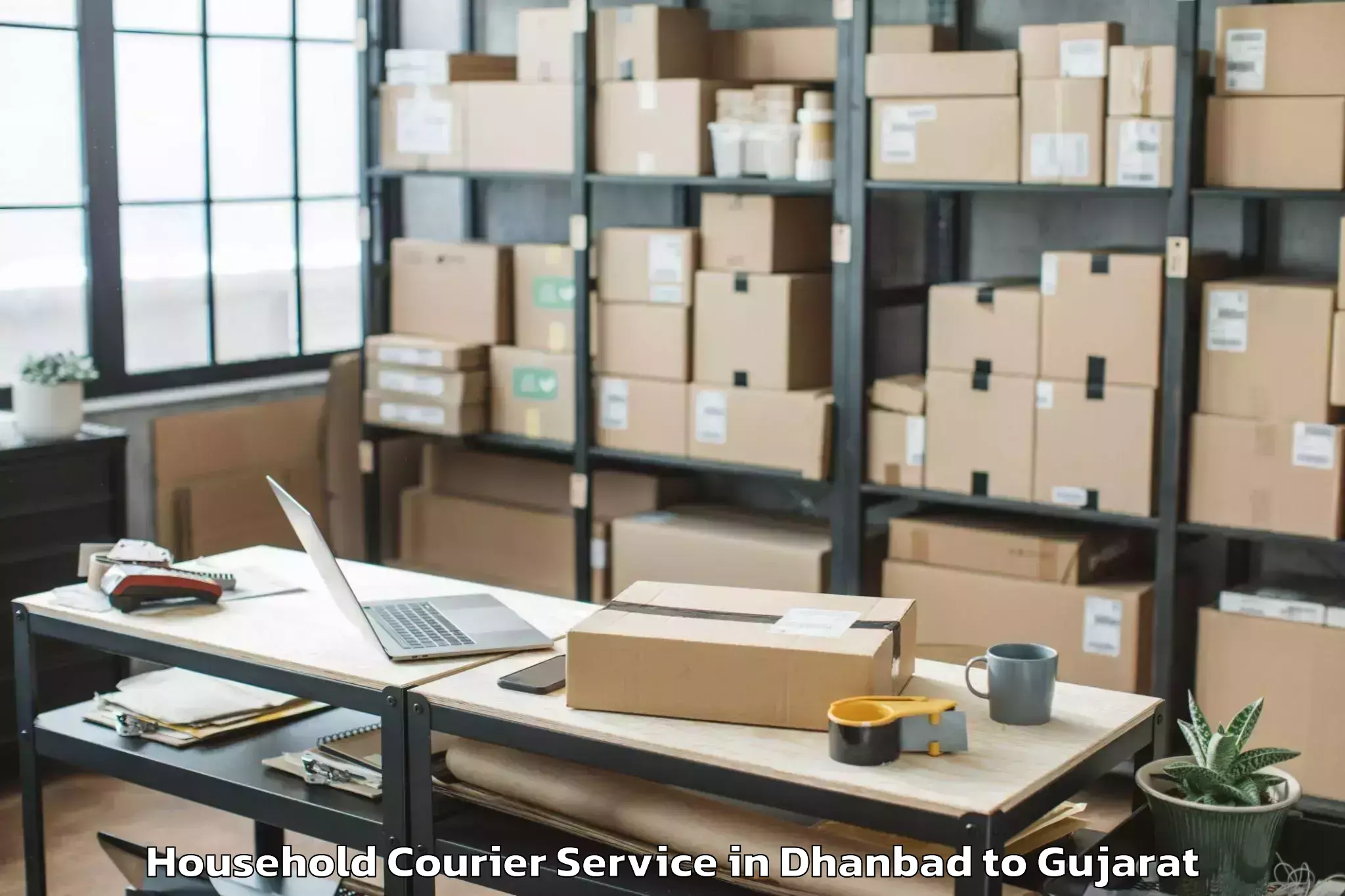 Dhanbad to Mendarda Household Courier Booking